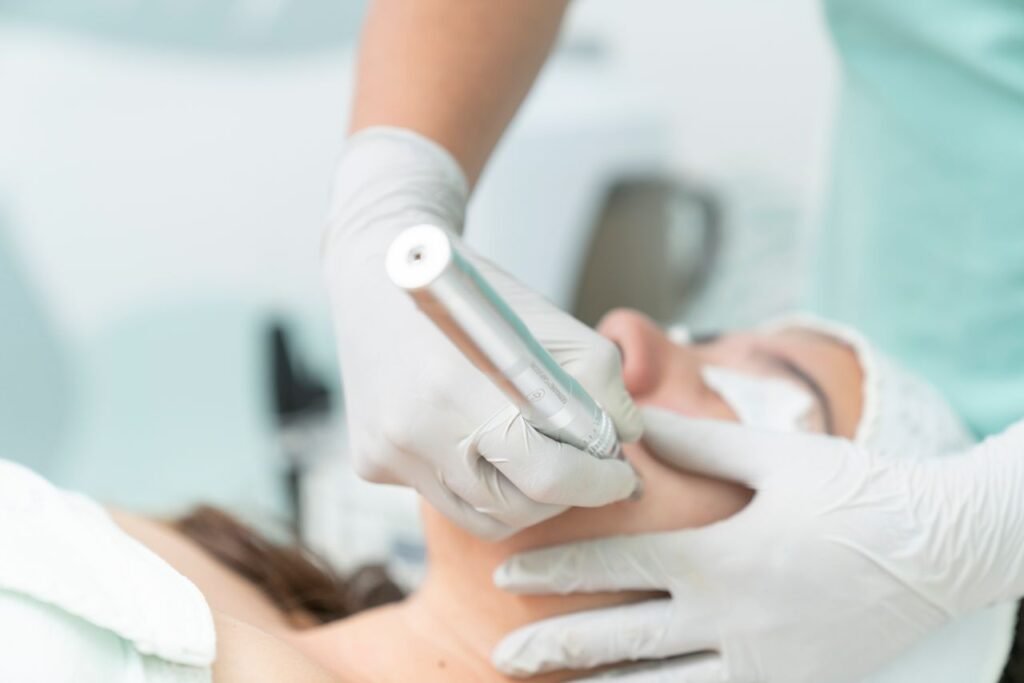 pexels-photo-14438367-14438367 Close-up of a cosmetic treatment being performed in a clinical environment.